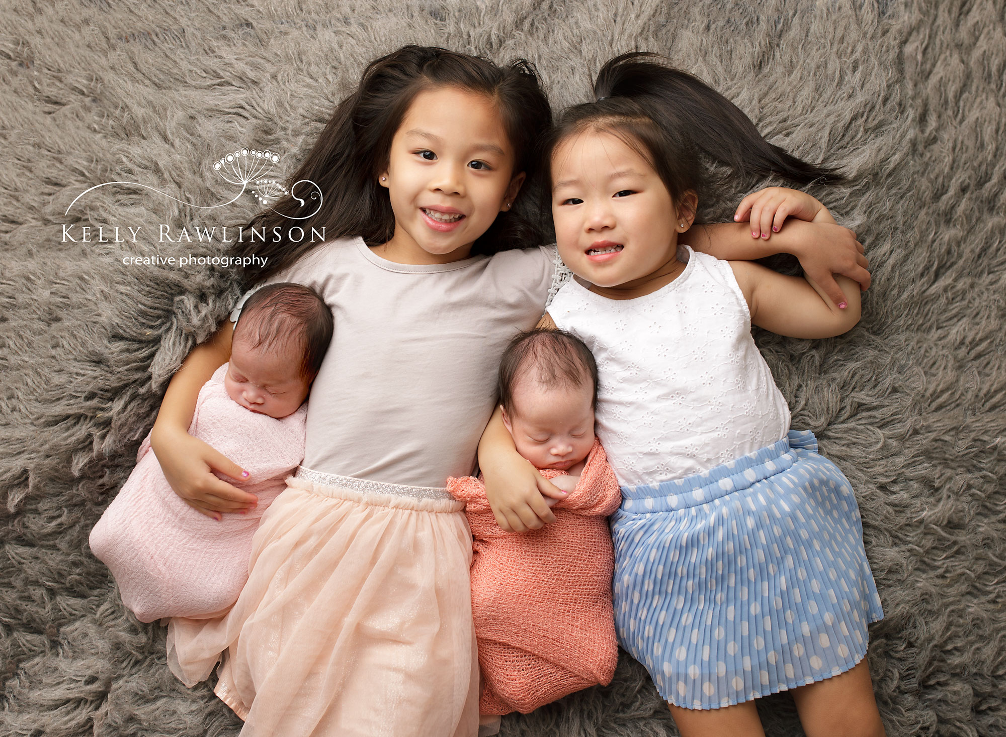 Aurora twin girls with older sisters