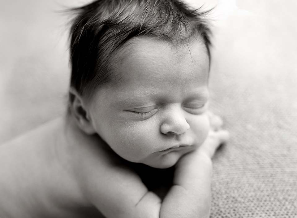 Black and white portrait of newborn baby girl
