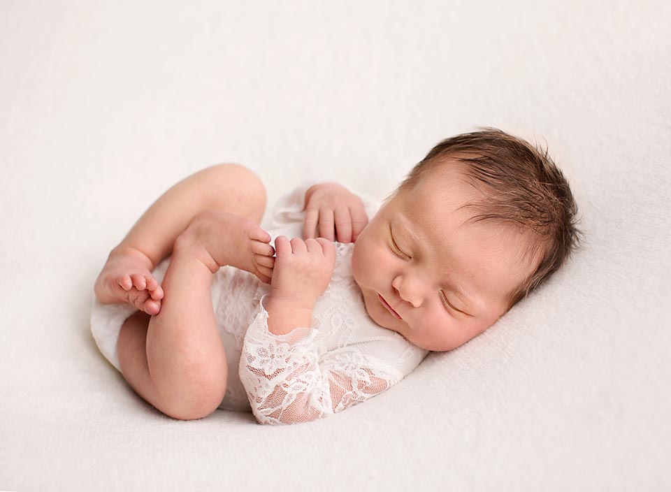 Sleeping newborn baby, professional newborn photography in Uxbridge