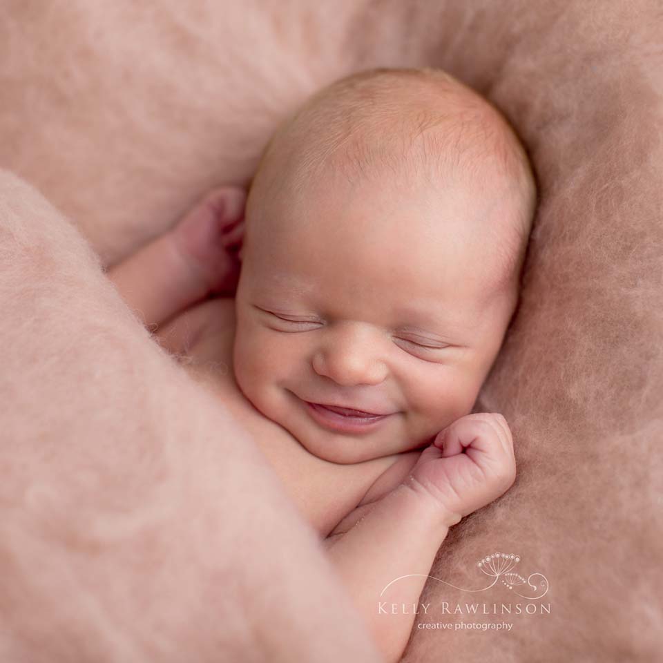 Smiley Newborn baby girl pictures