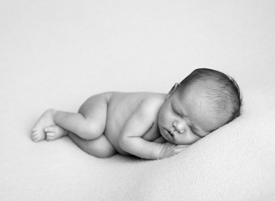 Black and white image of sleeping baby