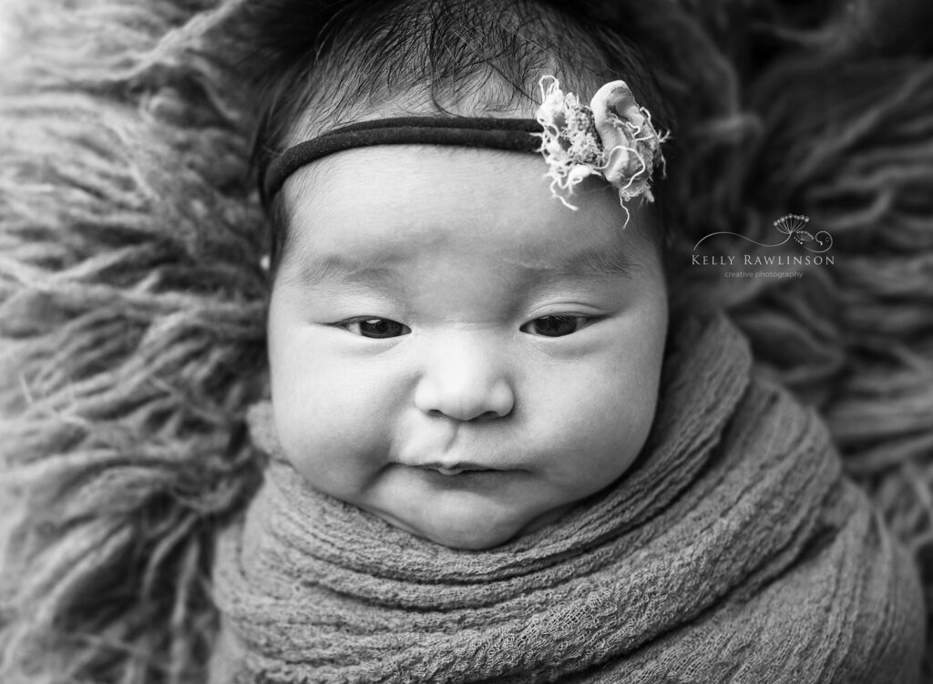 Black and white newborn photograph from professional photographer in Georgina
