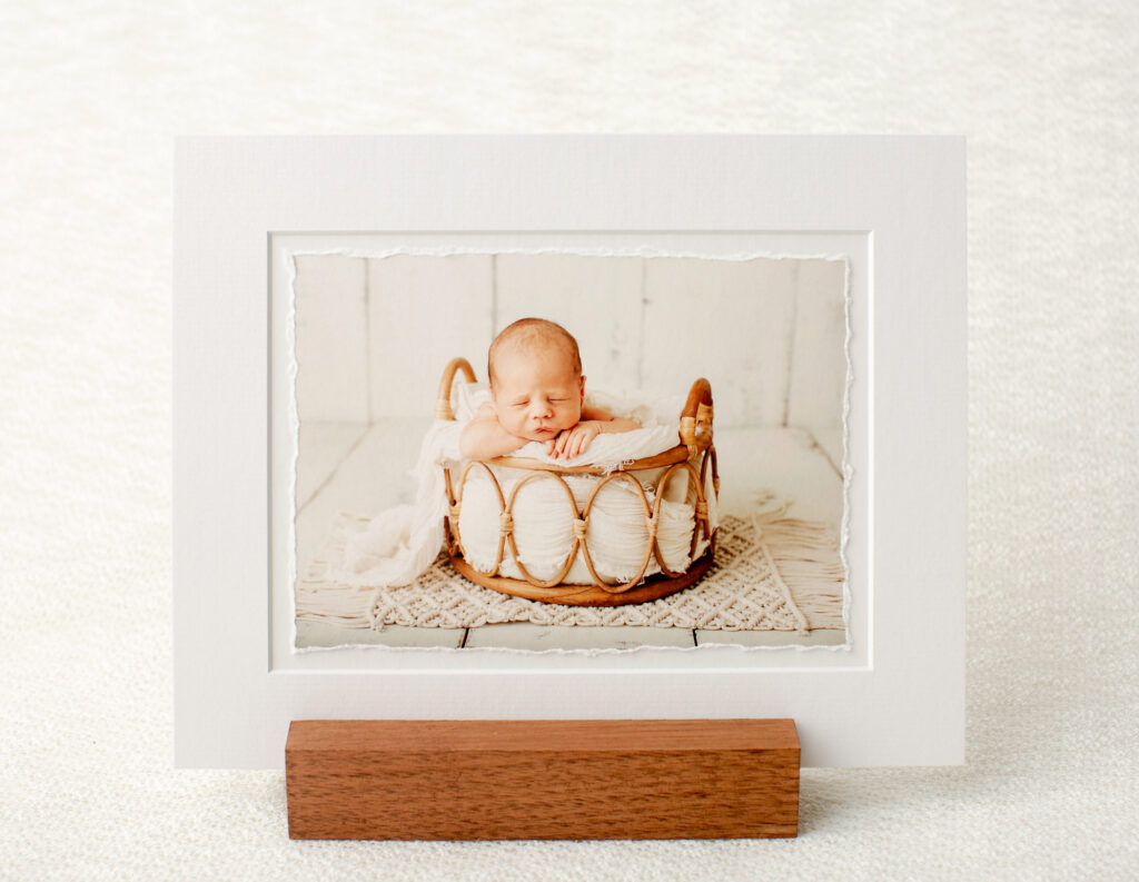 Fine Art Newborn photo displayed on an easel