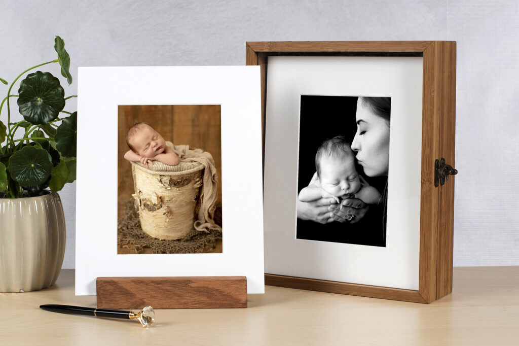 Printed newborn photographs in box