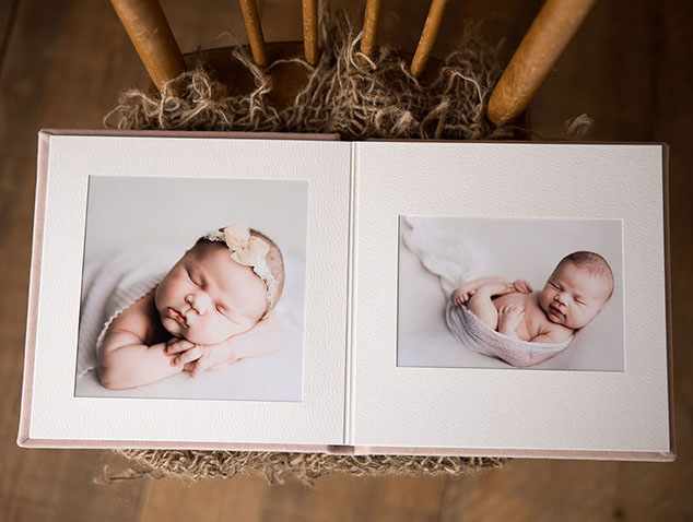 When to hire a professional photographer to create a photo album for your newborn