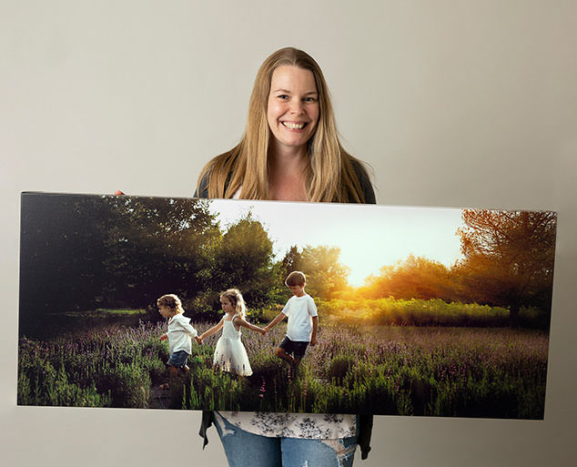 Hire a professional photographer to create canvas wall art for your family